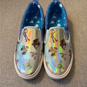 Ground Up Disney Pixar Women's Slip On Sneakers featuring an iridescent finish